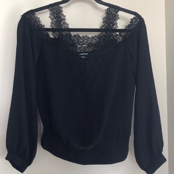 bebe Tops - Sold Bebe black lace trim cold shoulder blouse
